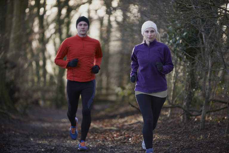 women meditating outside