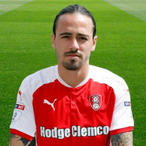 men playing football in a stadium